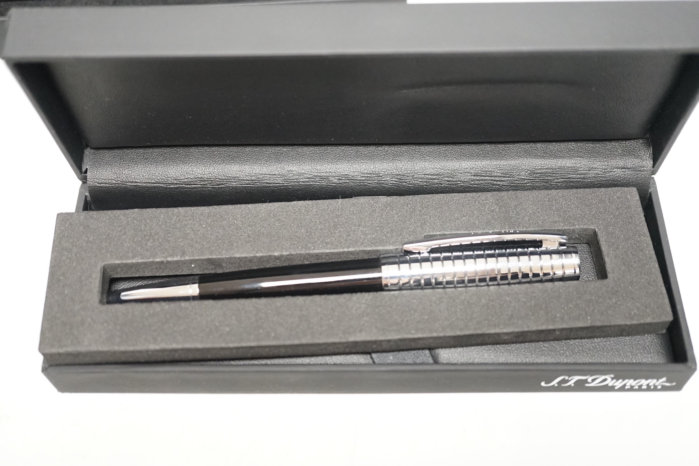 Two Dupont ballpoint pens and a Montegrappa Champions League Trophy fountain pen